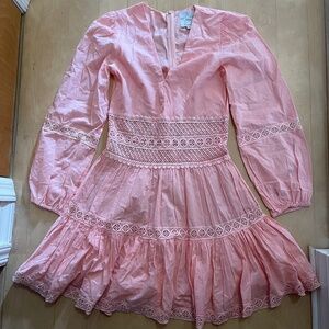 Pink dress with embroidered trim